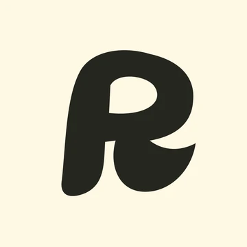 The $ROUND token: the Roundups mark in olive ink on a cream coin.